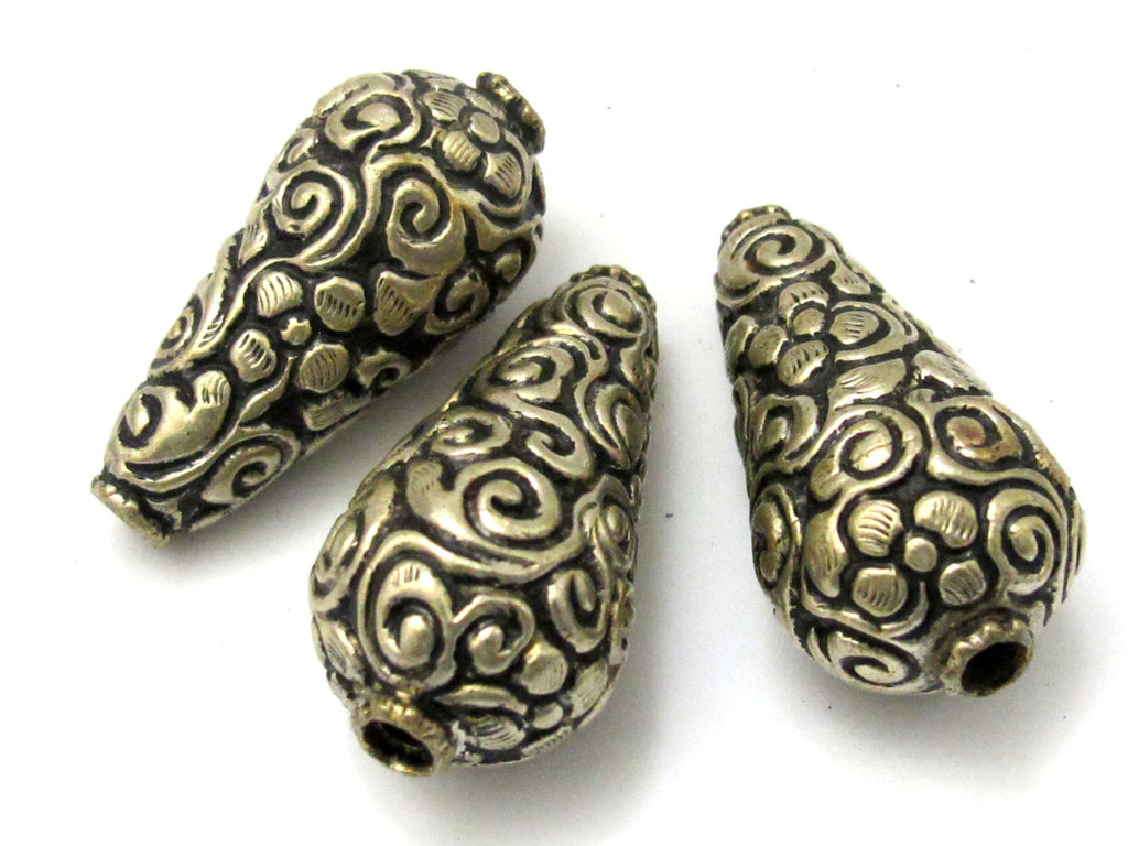 2 BEADS - Cone shape tibetan silver color floral repousse beads from Nepal - BD618A