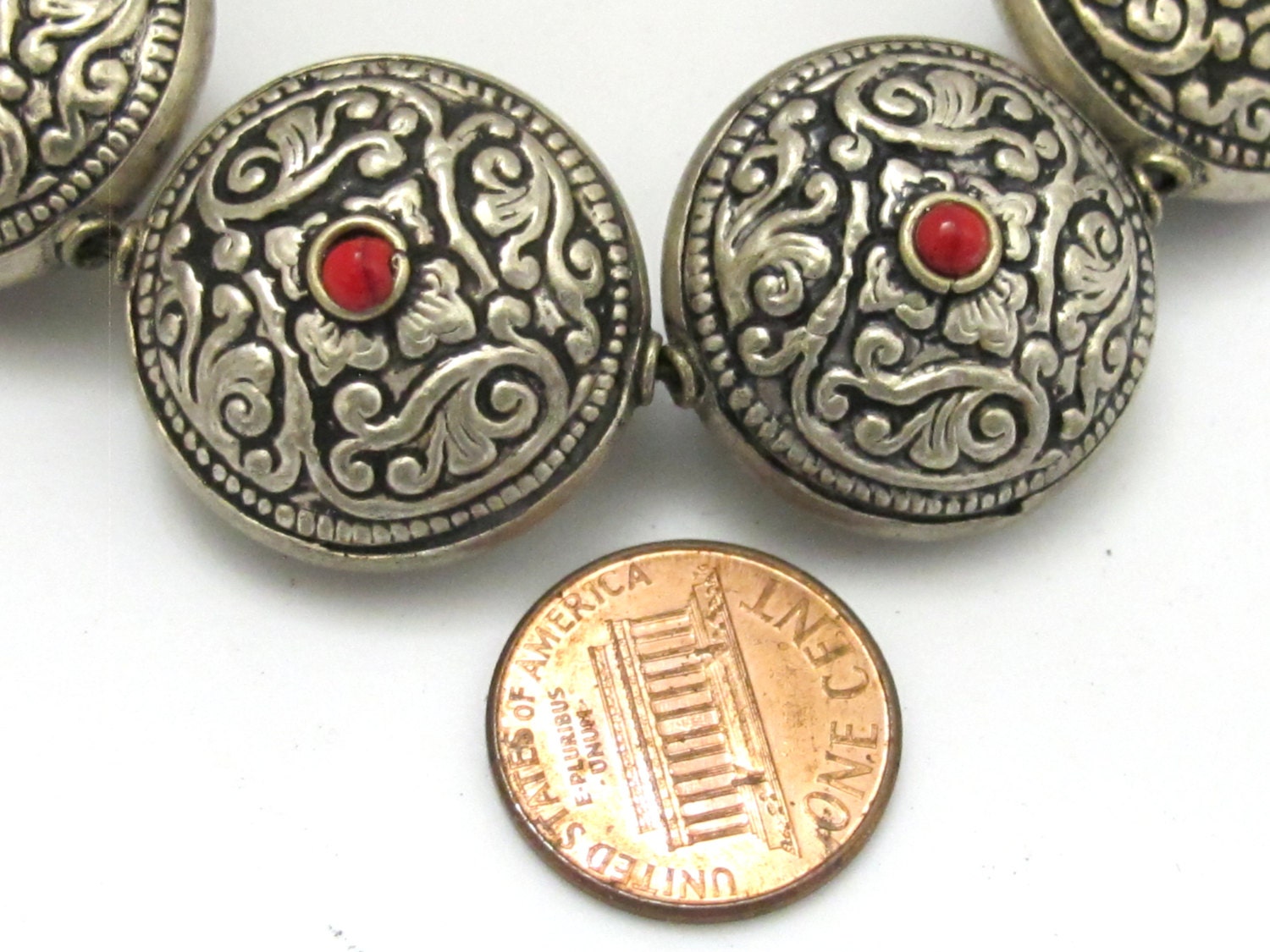 2 BEADS - Reversible Tibetan silver bead with floral repousse design - BD624B