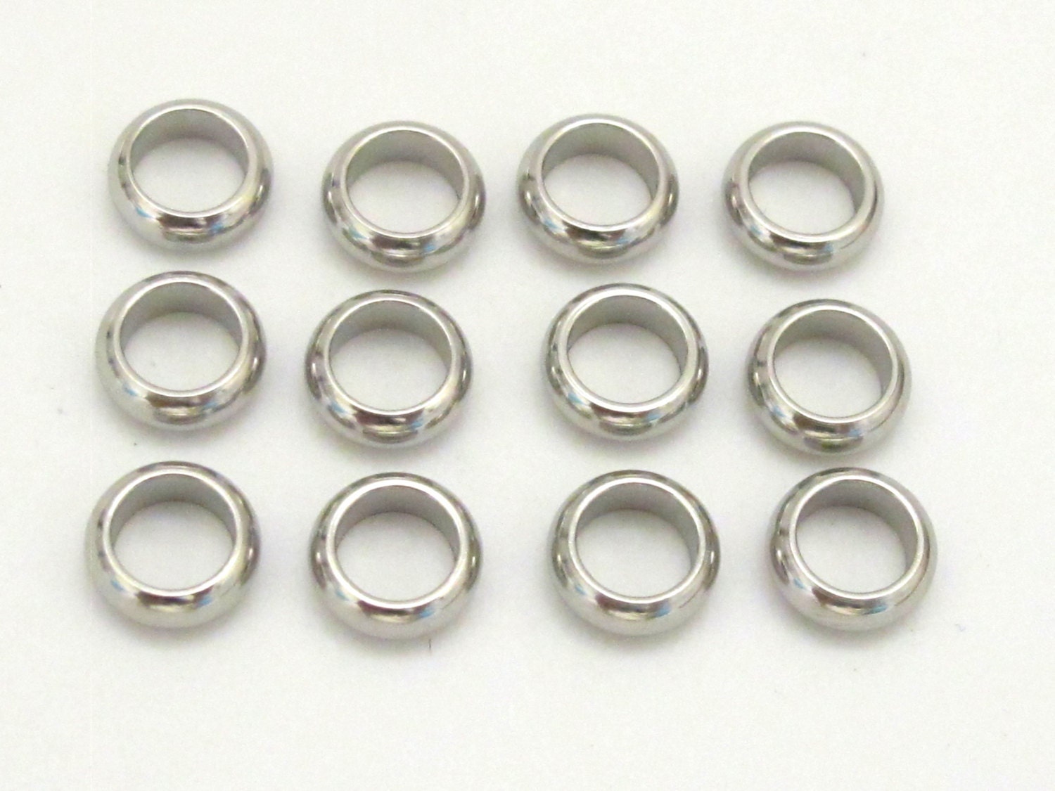 10 Beads - Stainless steel donut beads 8 mm wide - BD640