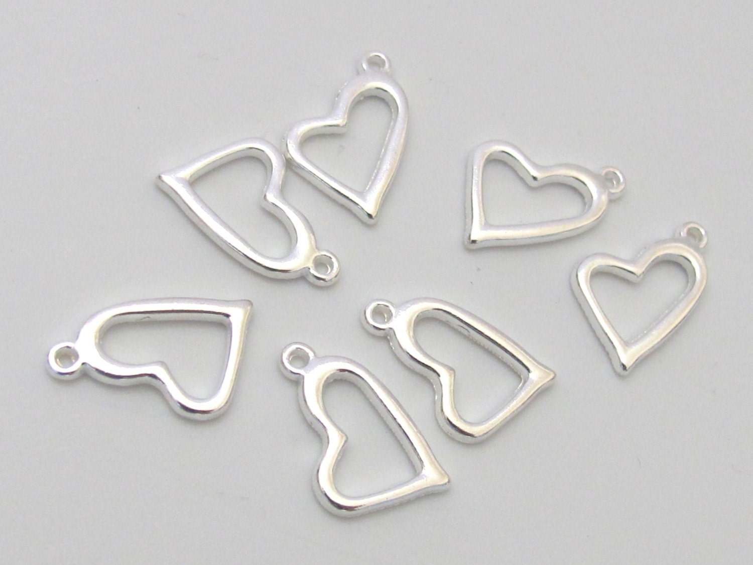 8 Heart shape charms silver tone 17 mm x 17 mm - CM087