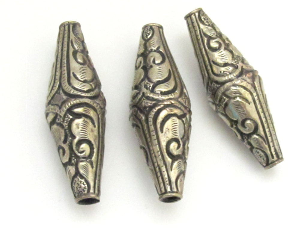 2 BEADS - Tibetan silver bicone shape floral repousse ethnic beads from Nepal - BD641A