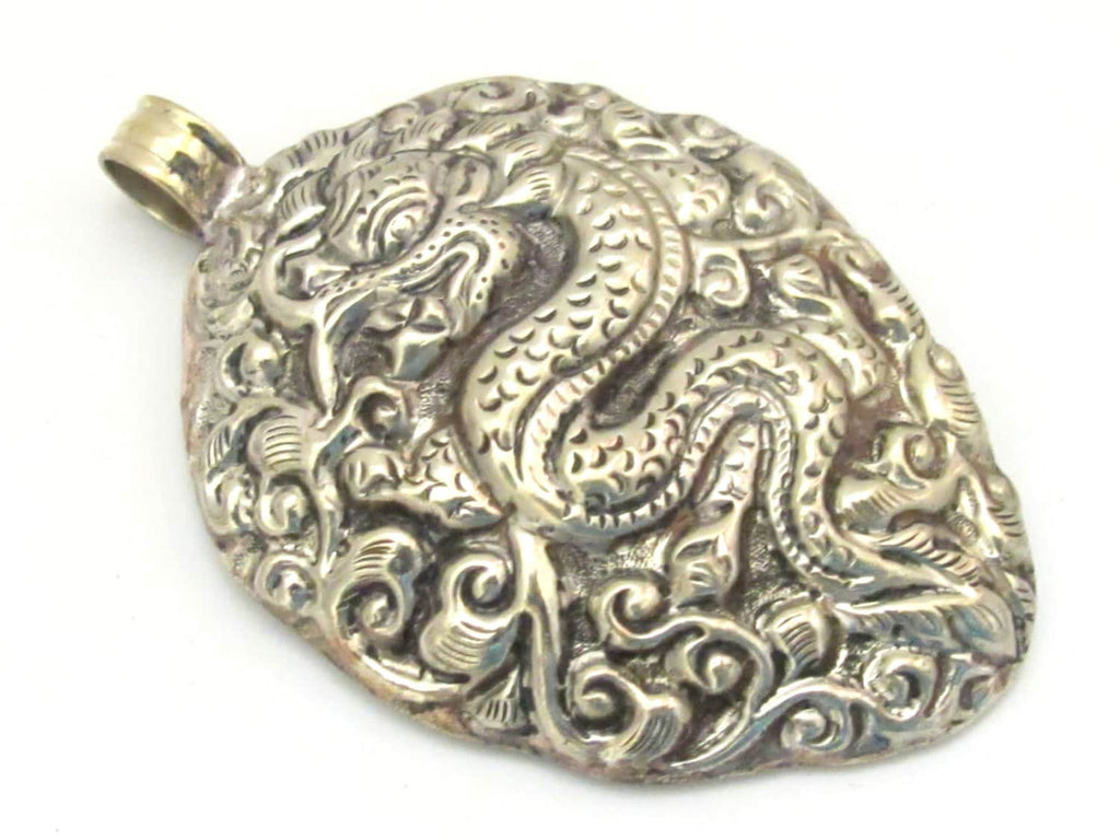 Tibetan silver repousse Dragon pendant with reverse side phoenix bird and floral repousse - PM270C