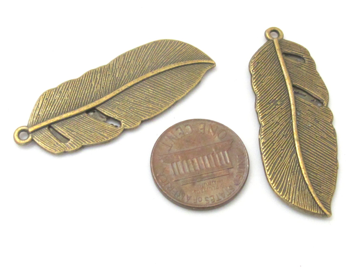 4 Large Brass tone feather charms 43 mm x 15 mm - CM092