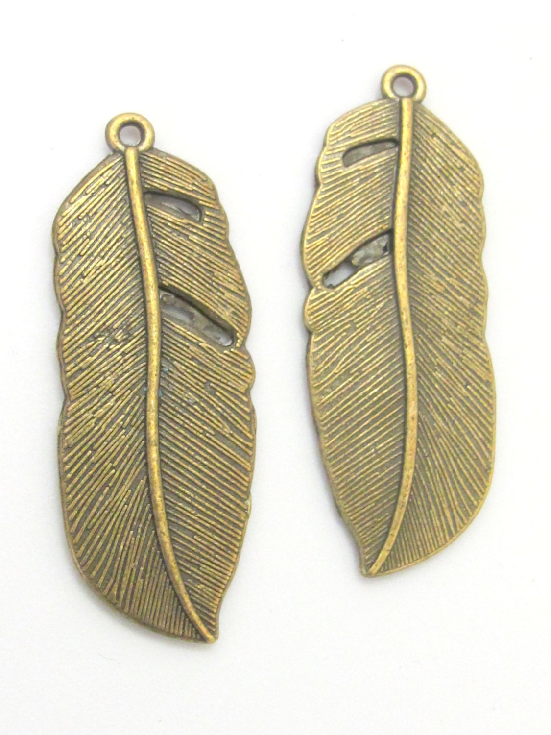 4 Large Brass tone feather charms 43 mm x 15 mm - CM092