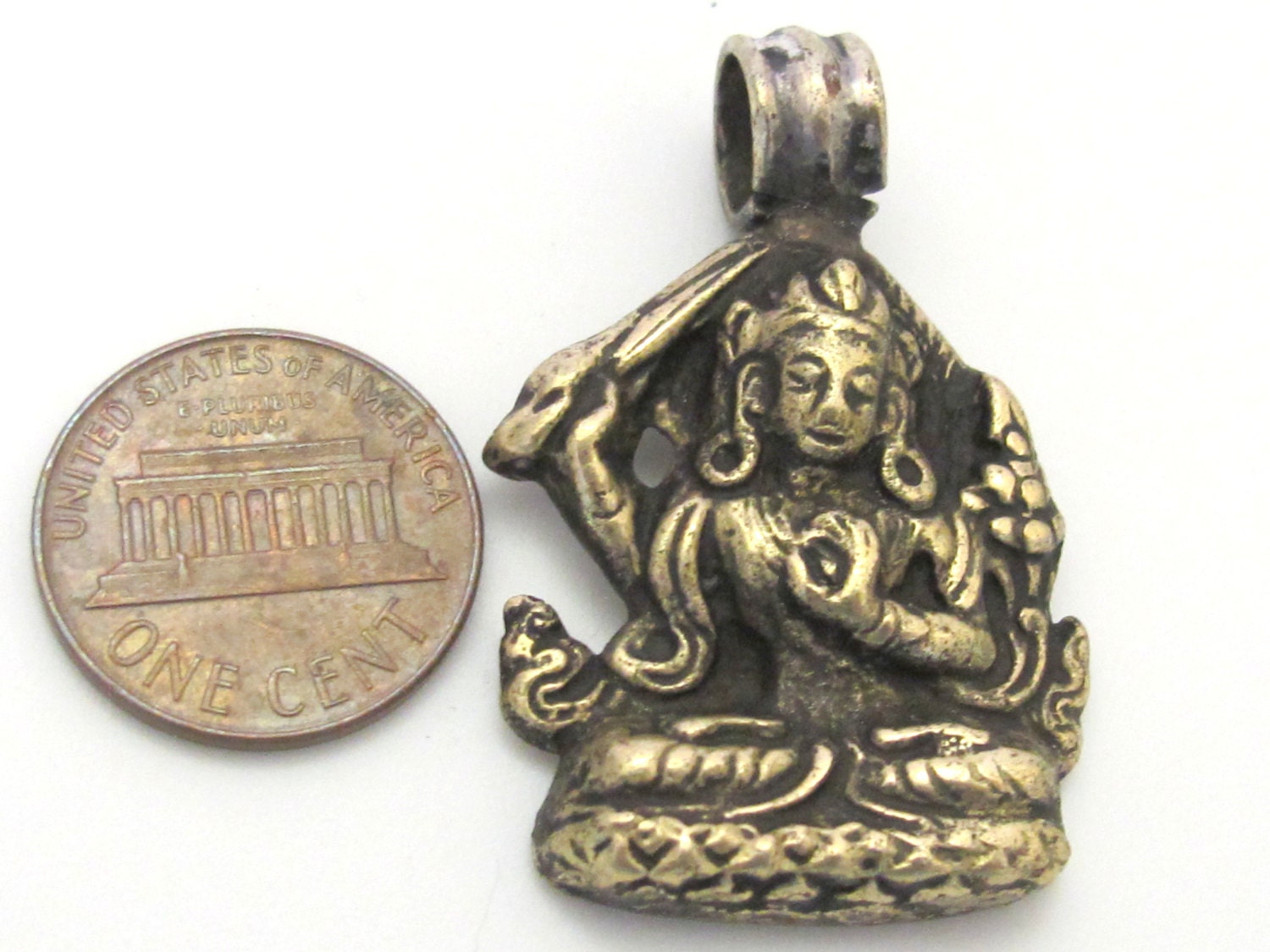 Tibetan solid Brass Manjushri pendant with reverse floral filigree from Nepal - CP070