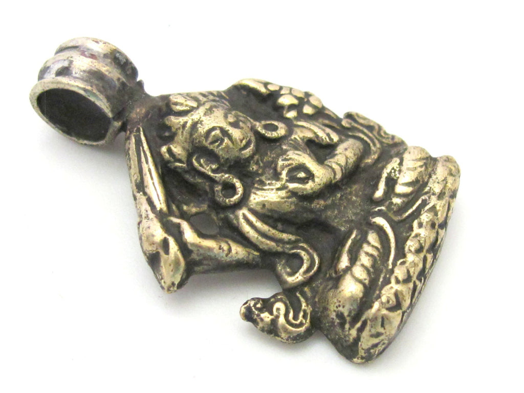 Tibetan solid Brass Manjushri pendant with reverse floral filigree from Nepal - CP070