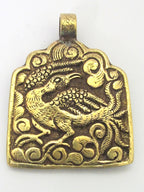 1 Pendant - Reversible ethnic forest deity brass pendant with reverse bird design from Nepal - CP074