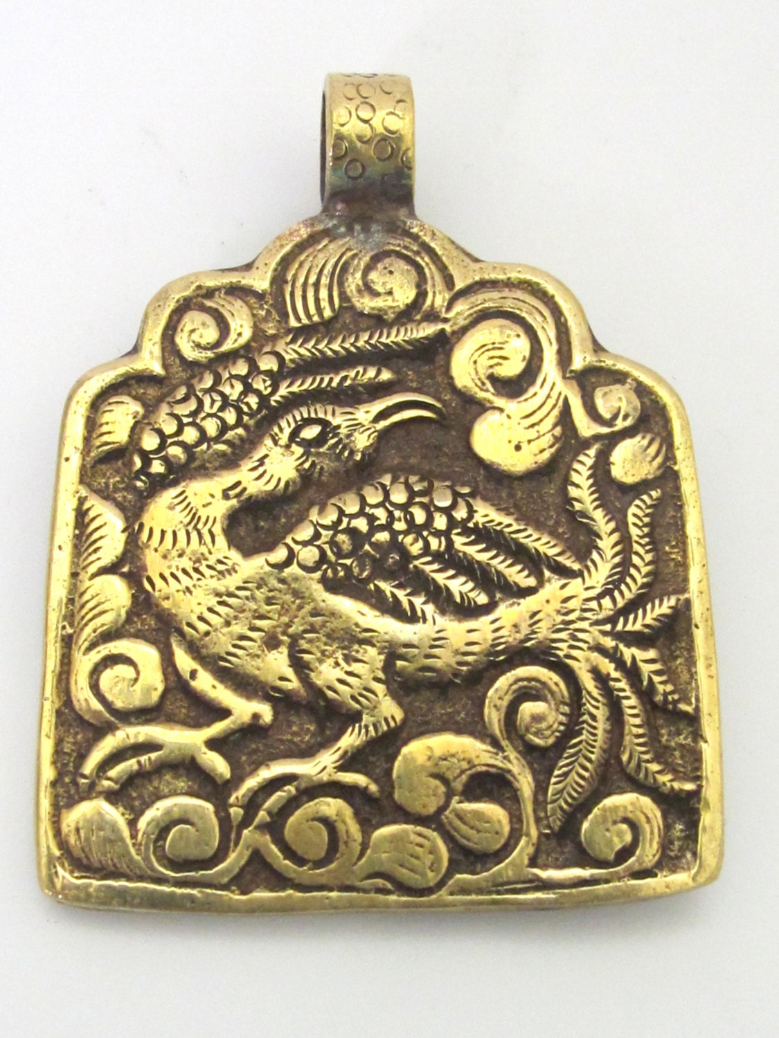 1 Pendant - Reversible ethnic forest deity brass pendant with reverse bird design from Nepal - CP074