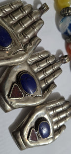 Large bold size Buddha hand lapis coral inlaid Om inscribed reversible pendant rustic finish- PM240A
