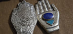Large bold size Buddha hand lapis turquoise l inlaid Om inscribed reversible pendant rustic antiqued finish- PM240B