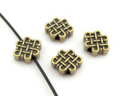 6 Beads - Reversible Tibetan infinity knot symbol brass tone small size beads 11 mm x 9 mm - BD668