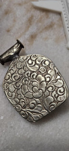 Tibetan antiqued silver finish green Vajrapani Buddha pendant with double fish symbol and reverse floral repousse - PM346C