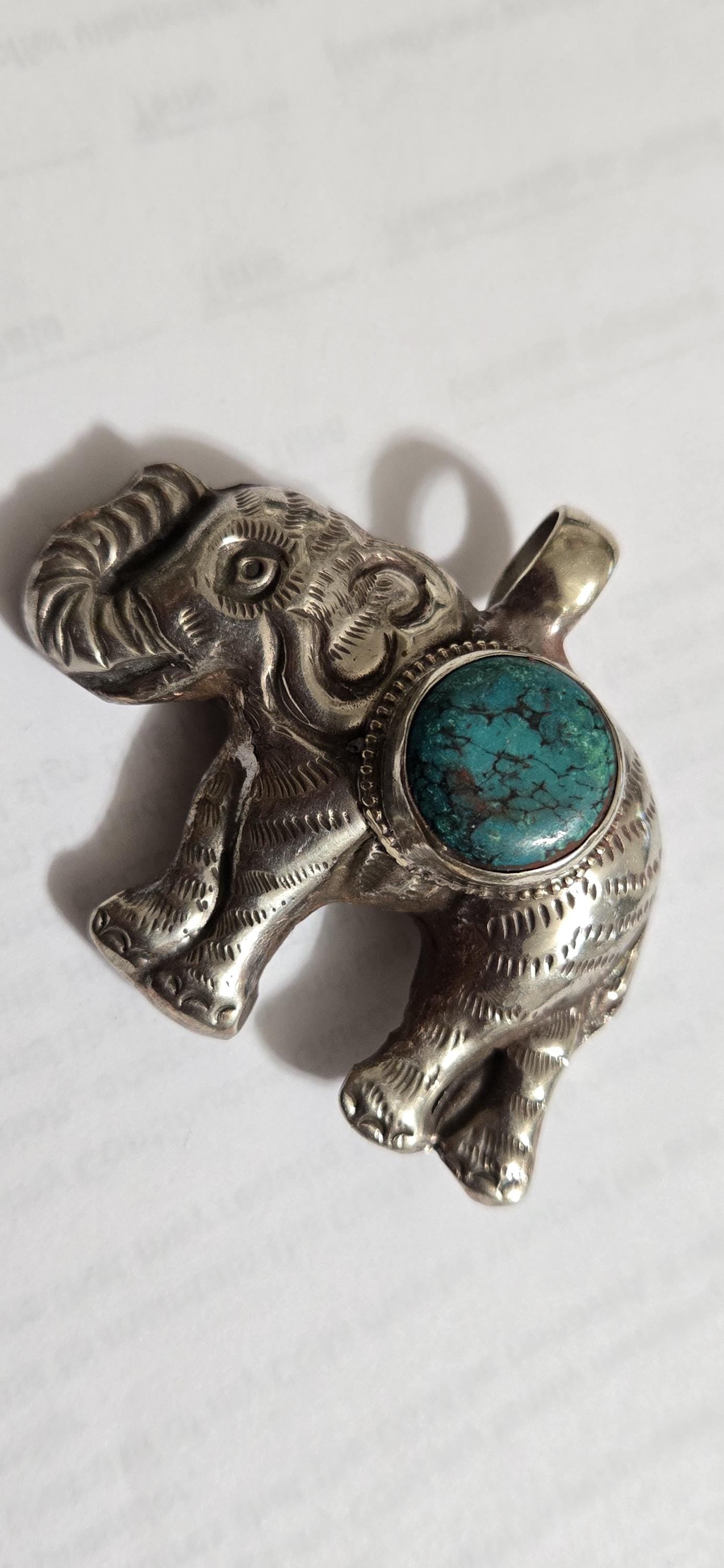 Tibetan Elephant Pendant with turquoise gemstone inlay | Handmade Repousse Jewelry from Nepal | Bold Animal pendant PM438A1