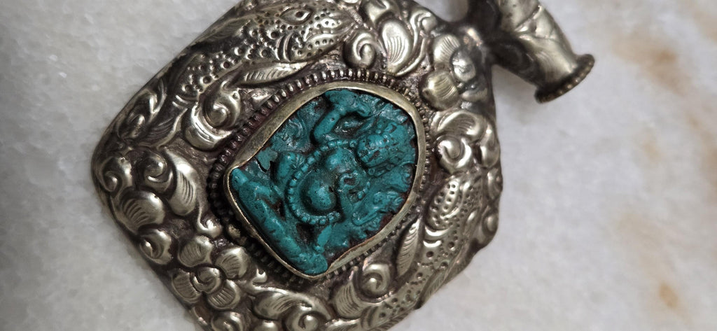 Tibetan antiqued silver finish green Vajrapani Buddha pendant with double fish symbol and reverse floral repousse - PM346C
