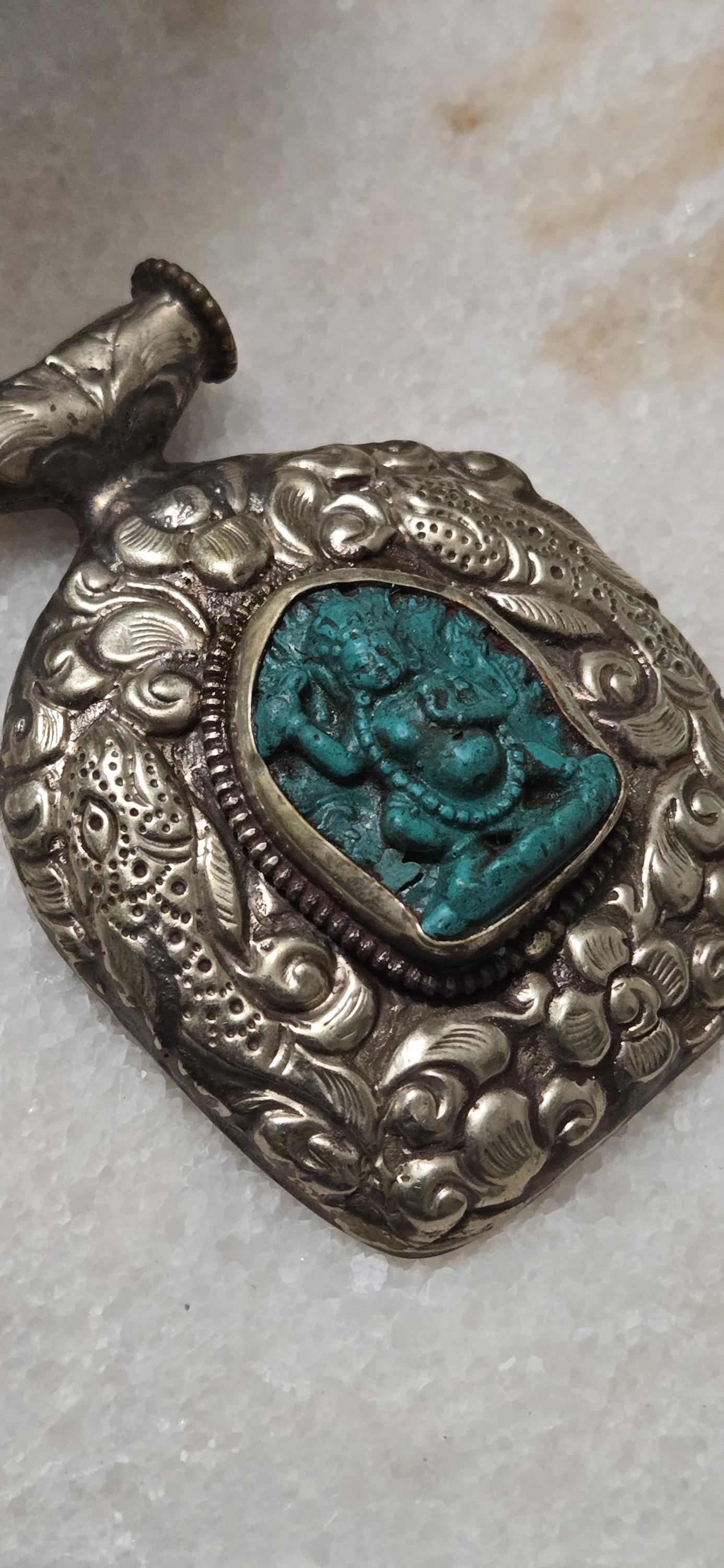 Tibetan antiqued silver finish green Vajrapani Buddha pendant with double fish symbol and reverse floral repousse - PM346C