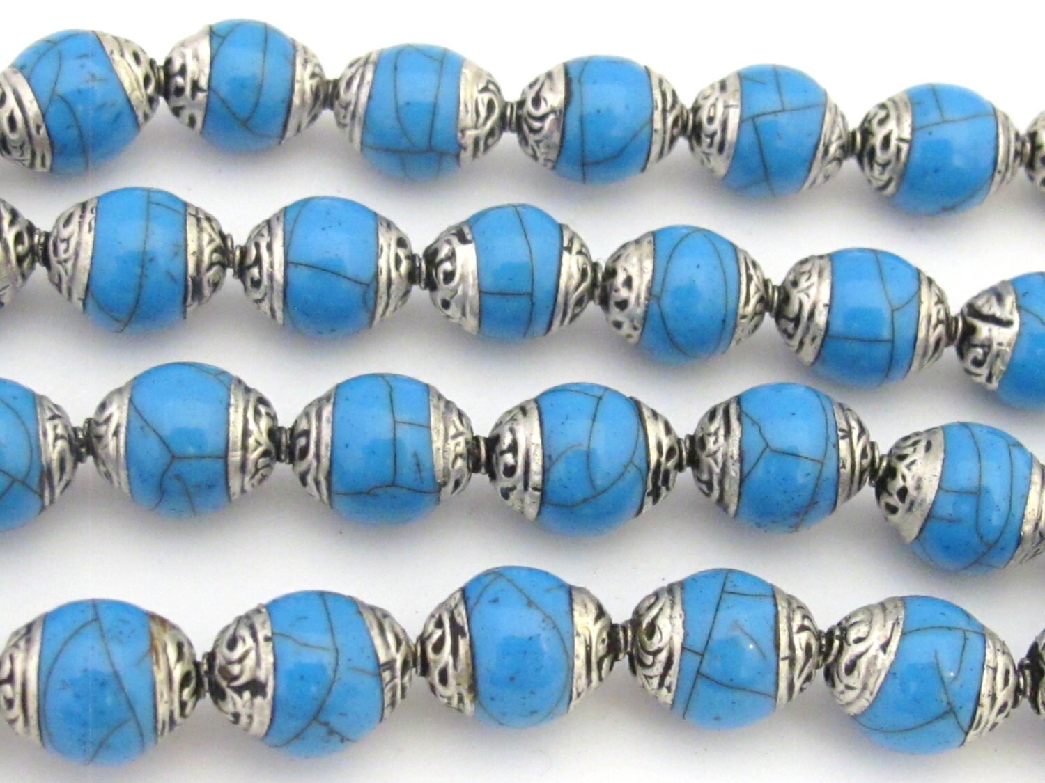4 BEADS - Tibetan silver capped Blue crackle resin beads - BD682