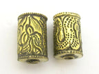 1 BEAD - Tibetan brass bead with long tail dragon repousse design - BD717