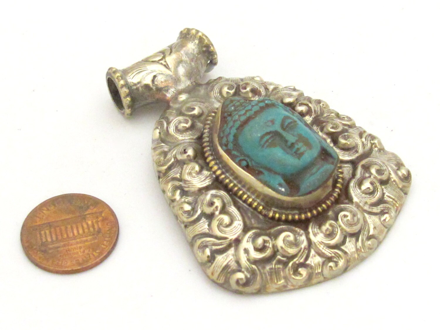 Tibetan silver green Buddha pendant with floral repousse details - PM337A
