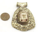 Tibetan silver white Buddha pendant with floral repousse details - PM336A