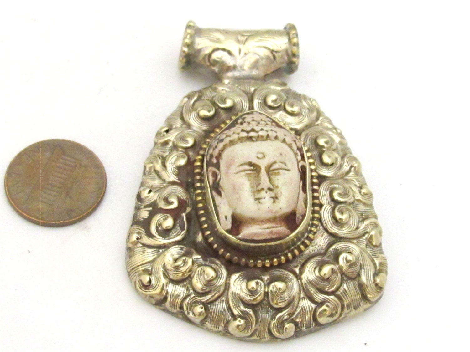 Tibetan silver white Buddha pendant with floral repousse details - PM336A