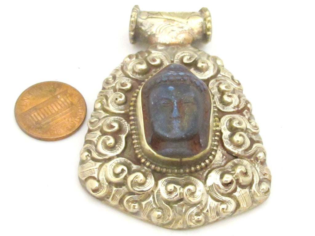 Tibetan silver blue Buddha pendant with floral repousse details - PM336B