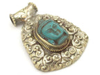 Tibetan silver green Buddha pendant with floral repousse details - PM337A