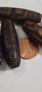 Long Tibetan etched agate dzi design 9 eye bead - etched agate beads - Nepalbeadshop GM130