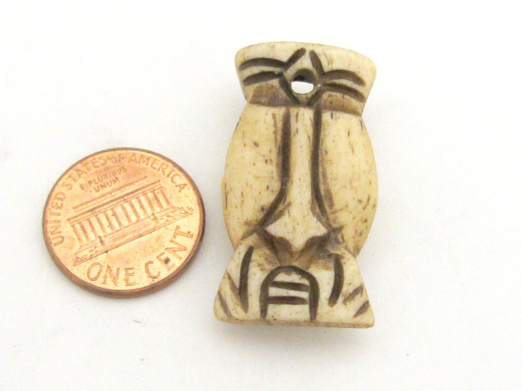 1 Pendant - carved face recycled cattle bone pendant from Nepal - PB092