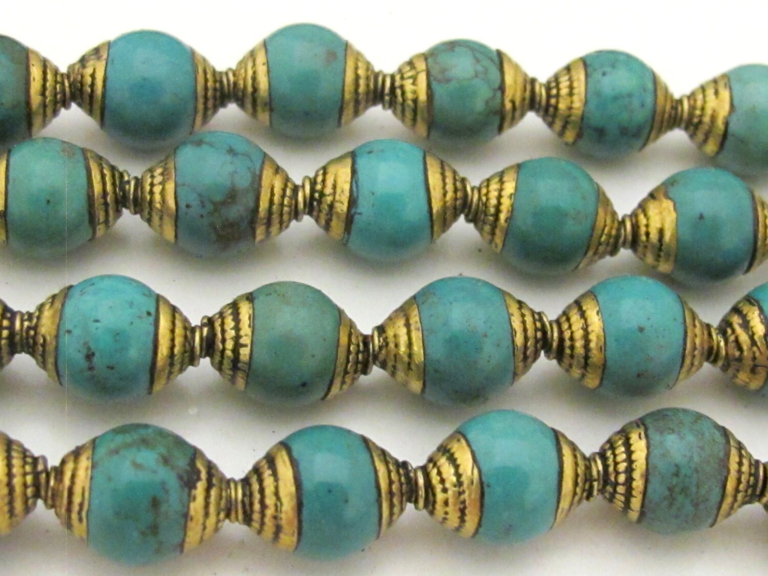4 BEADS - Ethnic Tibetan Brass capped turquoise beads from Nepal 9 - 10 mm x 13 -14 mm - BD781