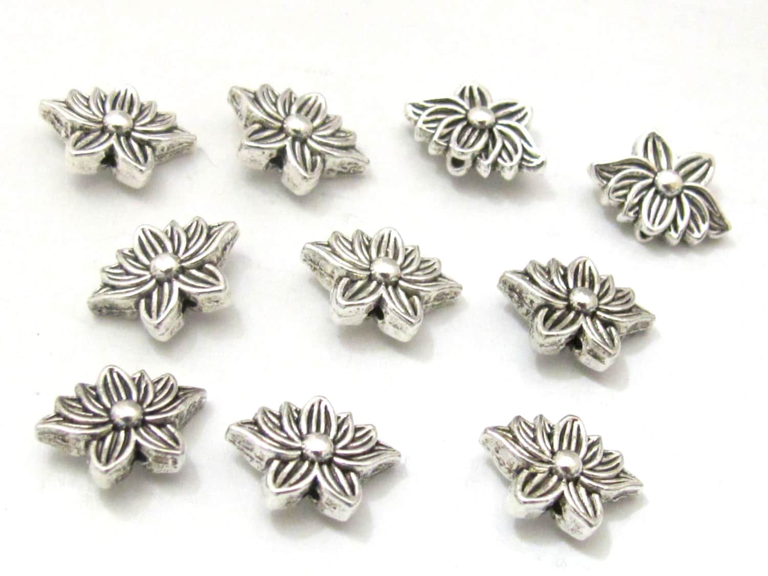 10 Beads - Antiqued silver tone small Lotus flower shape metal beads 8 mm x 12 mm - BD787