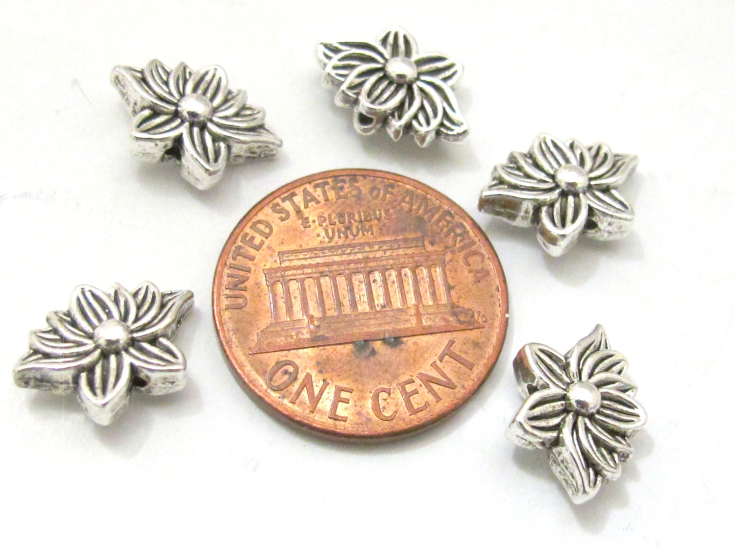10 Beads - Antiqued silver tone small Lotus flower shape metal beads 8 mm x 12 mm - BD787