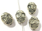 4 Beads - Reversible antiqued silver tone metal skull beads - BD293A