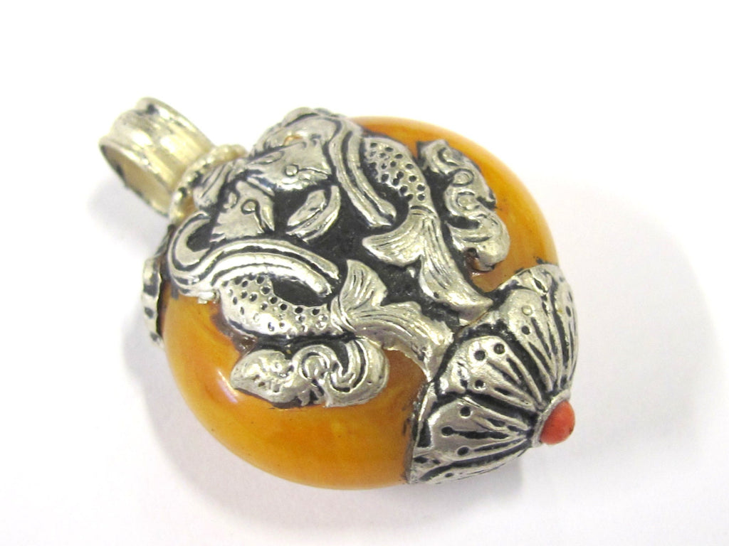 1 Tibetan pendant nepal pendant tibet Pendant charm - Reversible Tibetan silver double fish symbol copal resin pendant from Nepal - PM397