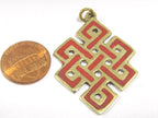 Tibetan endless knot symbol pendant with coral inlay from Nepal - PM416-CBA2
