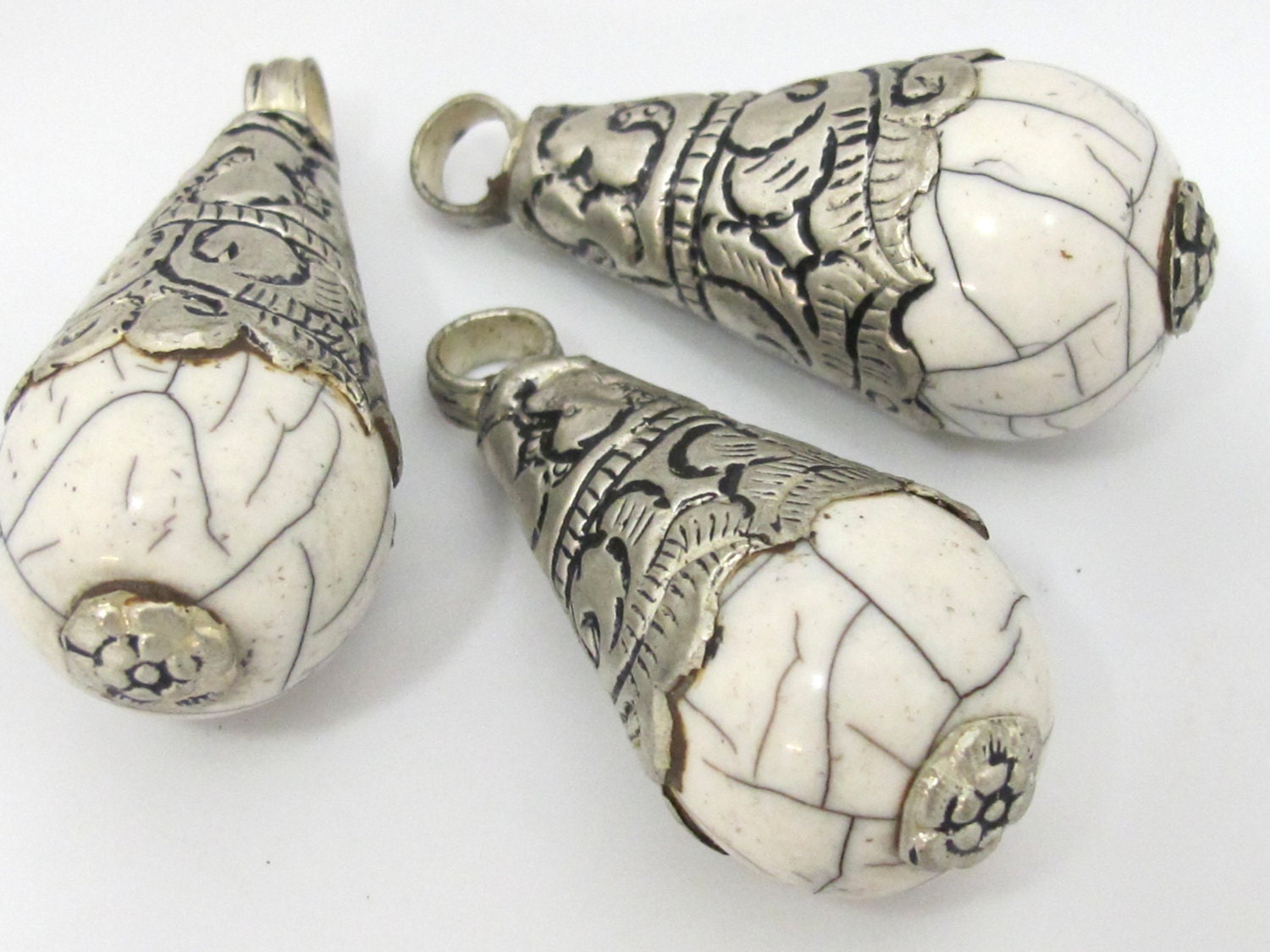 1 Pendant - Large size tibetan silver capped white crackle resin drop pendant with floral design on bail - PM453