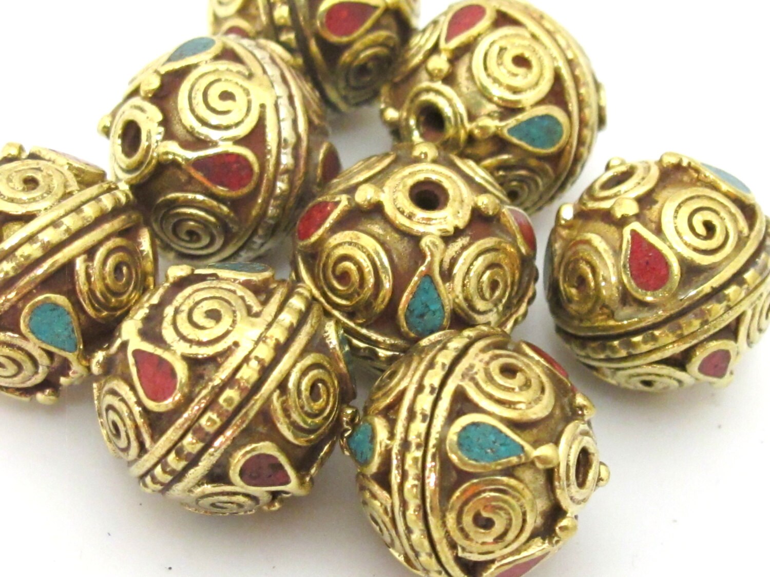 1 Bead - Tibetan brass bead with spiral design and turquoise inlay - BD908