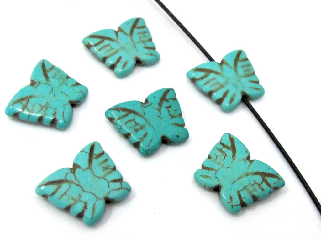 4 Beads- Blue turquoise color Howlite carved butterfly charm beads - GM401