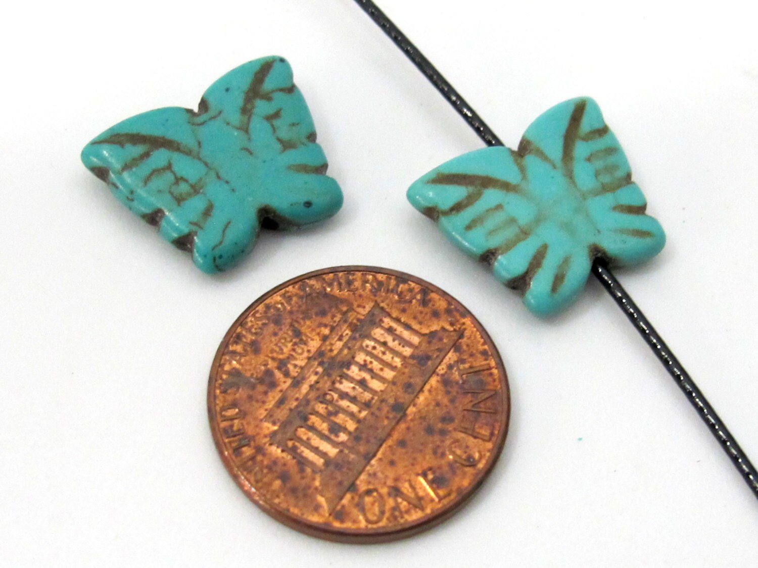 4 Beads- Blue turquoise color Howlite carved butterfly charm beads - GM401