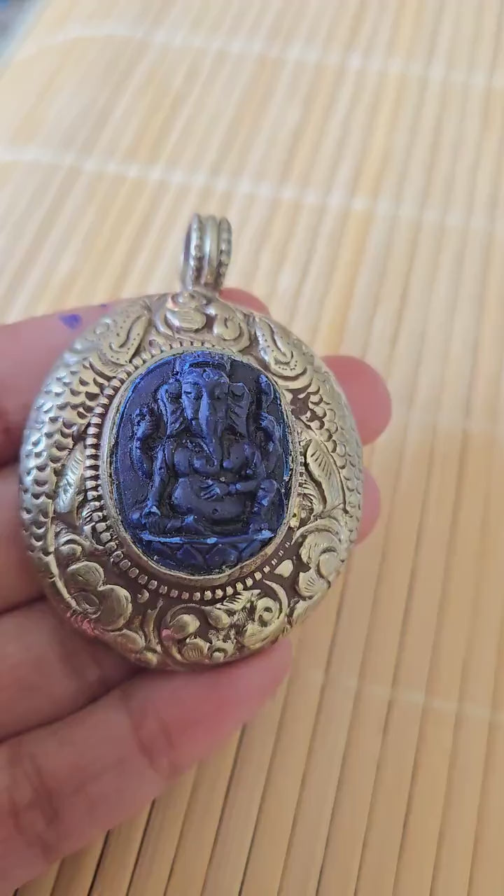 Tibetan silver blue  Ganesha pendant with Fish symbol on side and floral repousse on reverse - PM272K